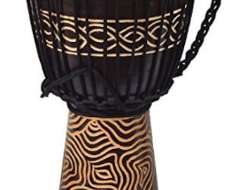 May include: A djembe drum featuring a dark brown wooden body with carved light-colored geometric patterns. The drum has a light-colored skin head secured by black rope tensioning cords and includes a braided black rope handle on the side.