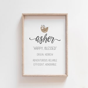 May include: A framed print with a sloth illustration and the name "Asher" in cursive. The text below reads "Happy, Blessed" and "Origin: Hebrew".  The print also includes the words "Adventurous, Reliable, Efficient, Honorable".