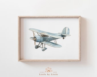 May include: A framed watercolor illustration of a blue biplane flying against a white background.