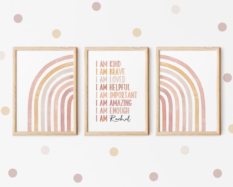 May include: Three framed prints with a watercolor rainbow design. The middle print has the text "I am kind, I am brave, I am loved, I am helpful, I am important, I am amazing, I am enough, I am Rachel".