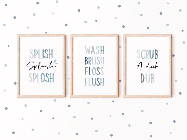 May include: Three framed prints with blue and white watercolor text. The first print says "Splish Splash Splosh", the second says "Wash Brush Floss Flush", and the third says "Scrub A Dub Dub".