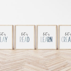 May include: Four framed prints with a white background and a light blue gradient text that reads "Let's Play", "Let's Read", "Let's Learn", and "Let's Create".