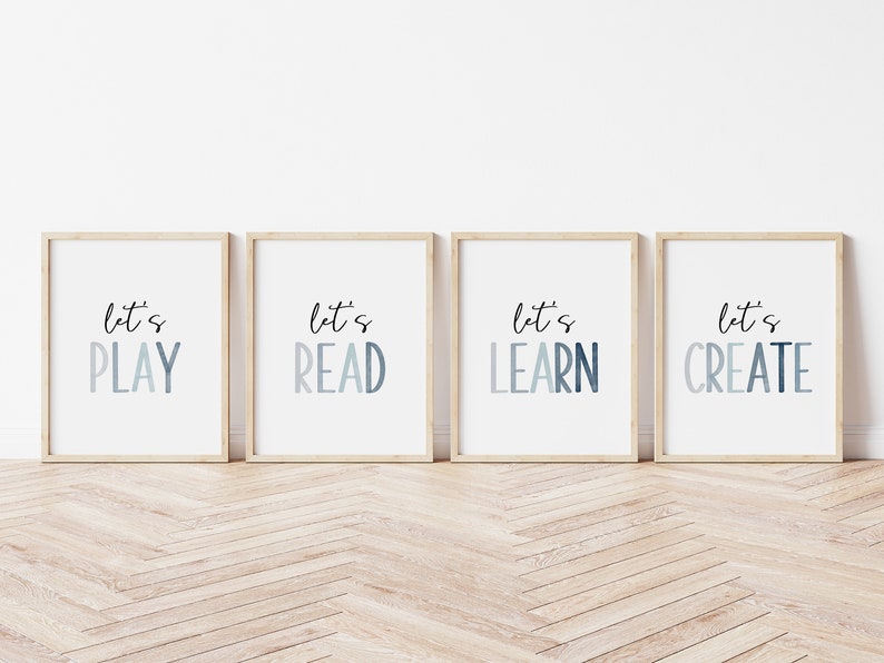 May include: Four framed prints with a white background and a light blue gradient text that reads "Let's Play", "Let's Read", "Let's Learn", and "Let's Create".