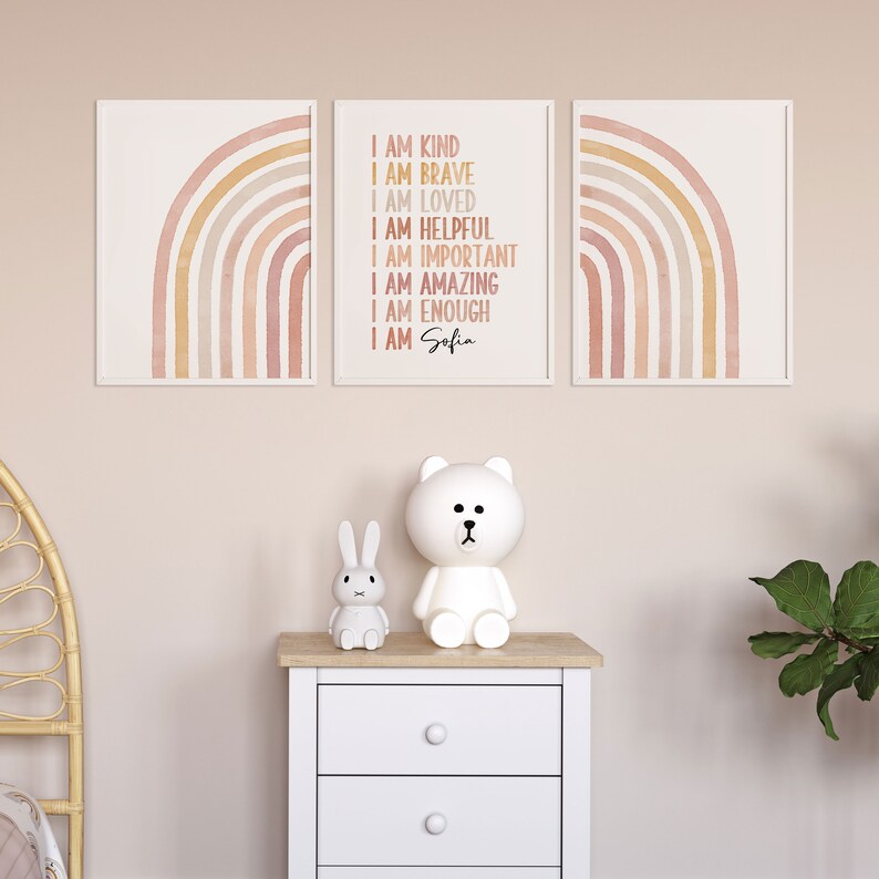 May include: Three watercolor rainbow prints with the text "I am kind, I am brave, I am loved, I am helpful, I am important, I am amazing, I am enough, I am Sofia" on the middle print.