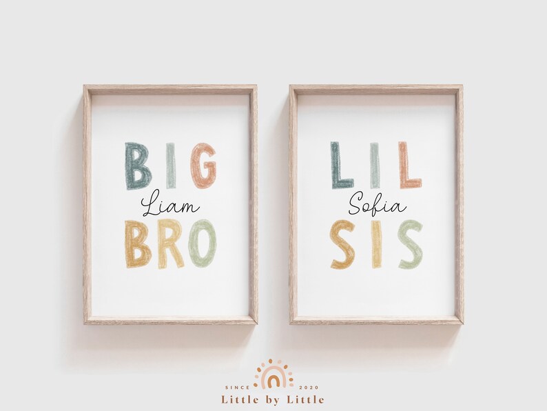 May include: Two framed prints with colorful text. The left print says "BIG Liam BRO" and the right print says "LIL Sofia SIS".