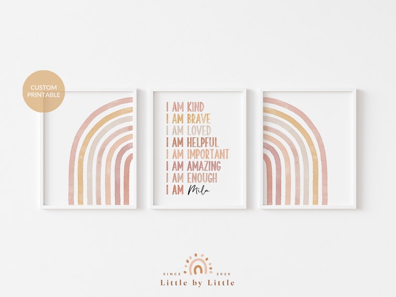May include: Three framed prints with a watercolor rainbow design. The center print features the text "I am kind, I am brave, I am loved, I am helpful, I am important, I am amazing, I am enough, I am Mila".