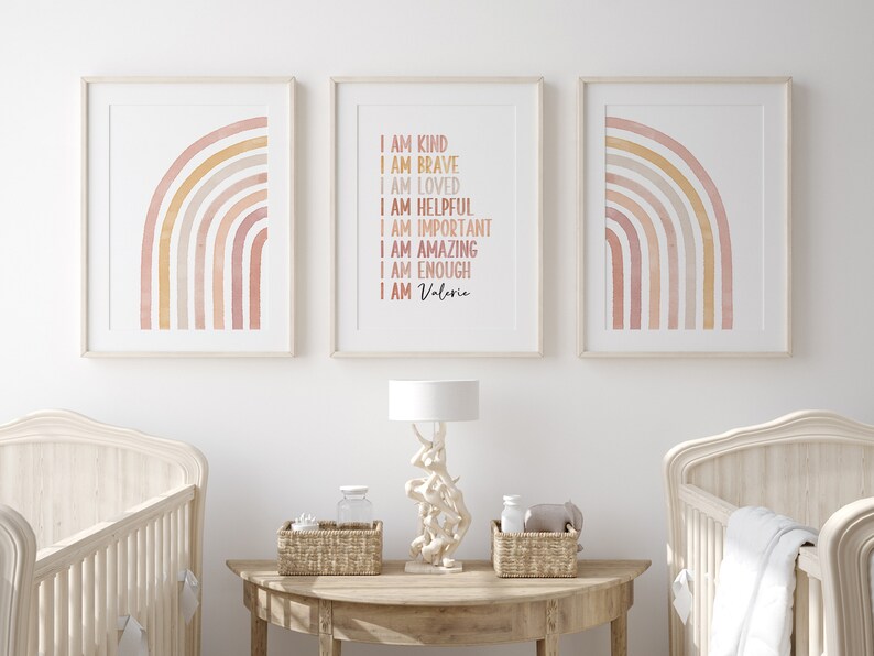 May include: Three framed prints with a watercolor rainbow design. The center print has the text "I am kind, I am brave, I am loved, I am helpful, I am important, I am amazing, I am enough, I am Valeria".