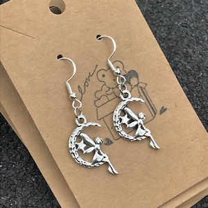 silver fairy on a moon drop earrings