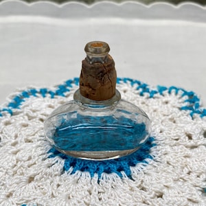 Antique Genie Bottle Perfume Bottle: Clear Glass with Crocheted Doily