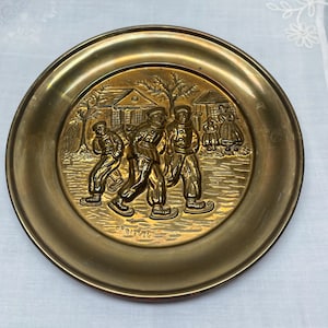Vintage Embossed Brass Plate: Dutch Skaters Scene, Peerage England