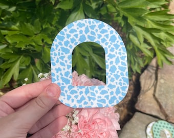 Blue cow print omnipod patch