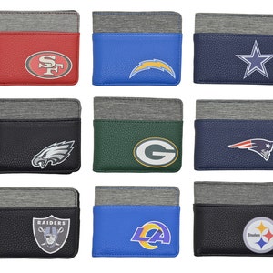 May include: Nine different NFL team wallets. Each wallet is black with a gray top flap and features a different NFL team logo. The logos are: San Francisco 49ers, Los Angeles Chargers, Dallas Cowboys, Philadelphia Eagles, Green Bay Packers, New England Patriots, Las Vegas Raiders, Los Angeles Rams, and Pittsburgh Steelers.