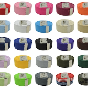 May include: Twenty-four different colored canvas belts with a silver buckle. The belts are all the same size and style, but they come in a variety of colors, including red, pink, blue, green, and black.