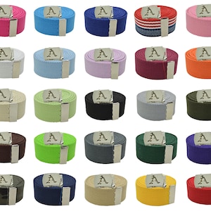 May include: A set of 24 canvas belts with a silver buckle. The belts are in a variety of colors, including pink, blue, white, light blue, purple, red, orange, beige, green, brown, gray, dark green, lime green, dark gray, navy blue, khaki, yellow, and red.