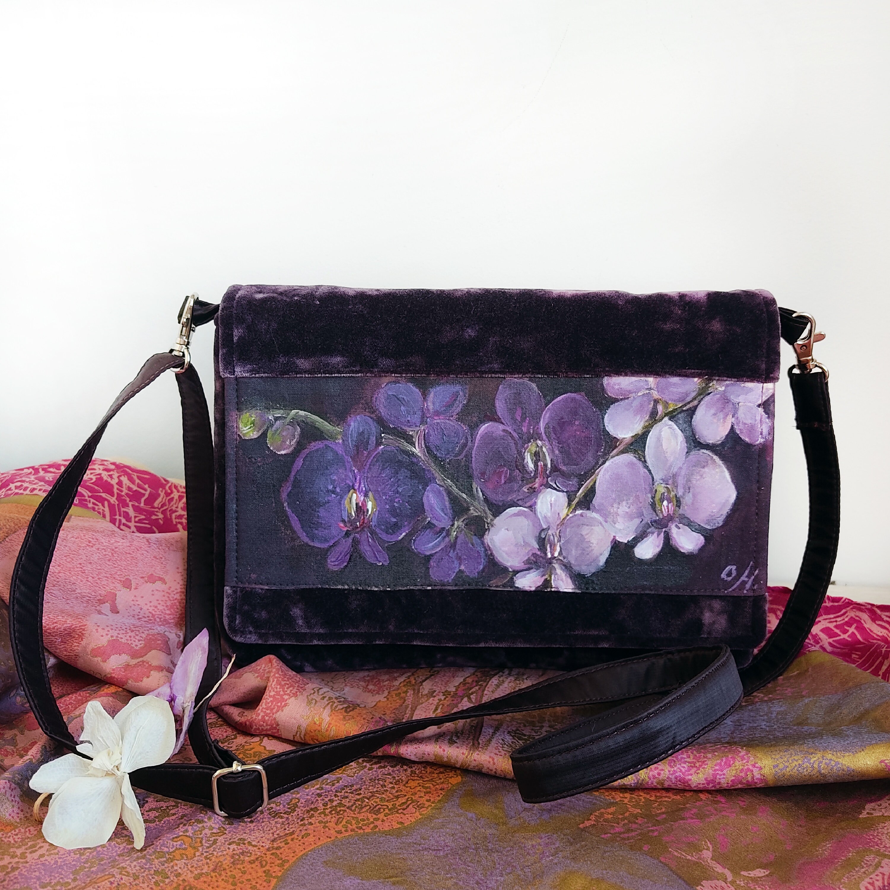 purple velvet clutch bag