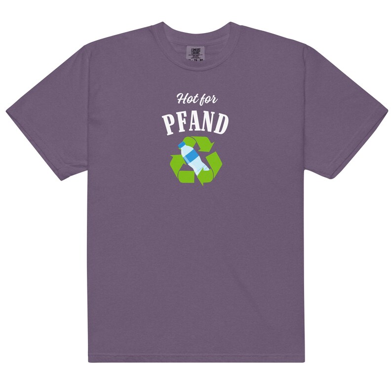 May include: A purple t-shirt with the words "Hot for Pfand" above a recycling symbol containing a water bottle. The shirt is made of a soft material and has a classic crew neck.