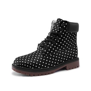 May include: Black and white polka dot work boot with a brown sole. The boot has black laces and a black collar. The boot is a classic style with a modern twist.