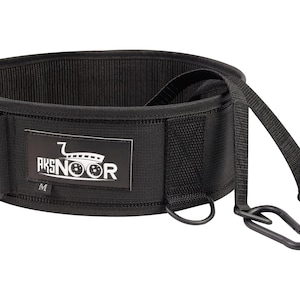May include: Black weightlifting belt with the text "AKSNOOR" on a white label. The belt has metal D-rings and carabiner clips. The belt is a medium size.