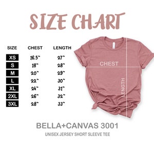 May include: Size chart for a unisex jersey short sleeve tee, showing chest and length measurements in inches for sizes XS to 3XL. The chart is printed on a white background with a pink t-shirt displayed next to it.