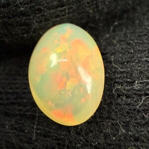 Ethiopian Opal Cabochon: Oval Gemstone for Jewelry Making (1.6 Cts, 9x6.5x4 mm)