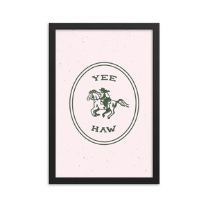 May include: A green and white illustration of a cowboy riding a horse inside a circle with the words "Yee Haw" on a pink background.