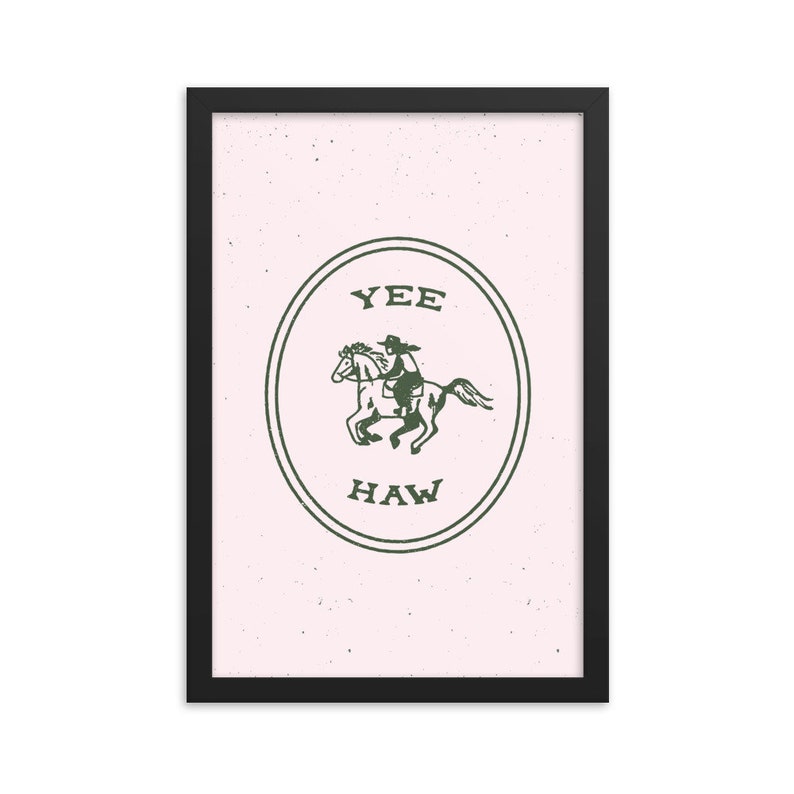May include: A green and white illustration of a cowboy riding a horse inside a circle with the words "Yee Haw" on a pink background.