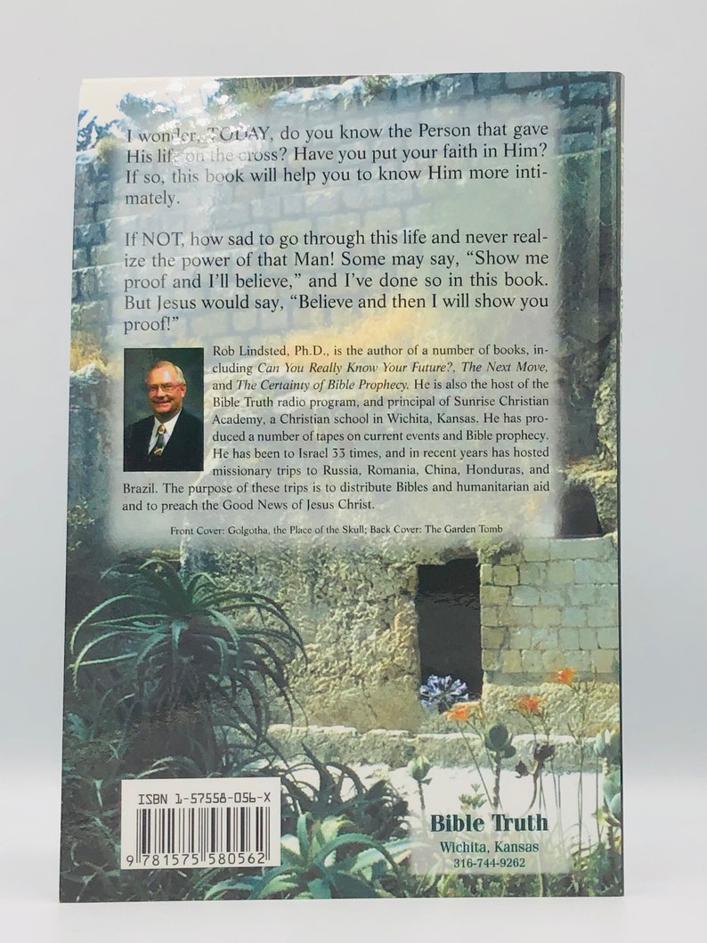 May include: A book cover with a photo of a man in a suit and tie. The book title is "Bible Truth" and the author is Rob Lindsted. The book cover also features a photo of a garden tomb.