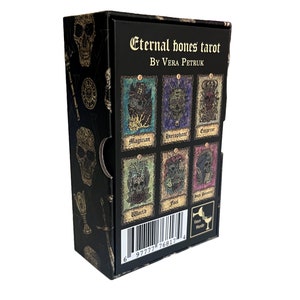 May include: A black box with a gold skull design and the text "Eternal bones tarot" and "By Vera Petruk". The box shows a preview of the tarot cards with images of skulls and the names "Magician", "Hierophant", "Emperor", "World", "Fool", and "High Priestess".