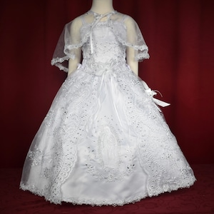 Adorable christening dress with embroidery of the Virgin of Guadalupe