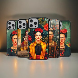 May include: Five different phone cases featuring colorful illustrations of Frida Kahlo. Each case has a different background and design, with Frida Kahlo depicted in a variety of poses and expressions.