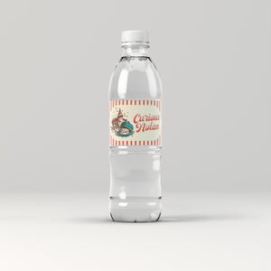 May include: A clear plastic water bottle with a red and white striped label that says "Curious Nolan". The label features a cartoon illustration of a child wearing a party hat.