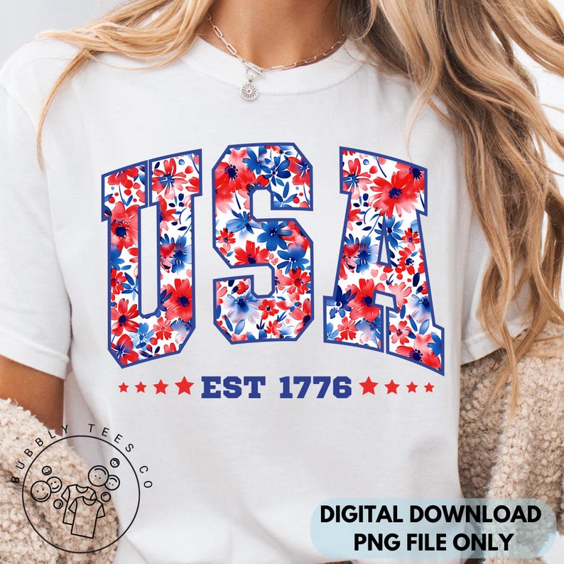 May include: White t-shirt with the word "USA" in a collegiate font, filled with a floral pattern of red and blue flowers. Below the word "USA" is the text "EST 1776" with stars on each side. The shirt is a digital download.