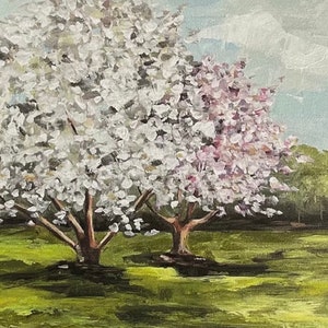 May include: A painting of two flowering trees in a field. The tree on the left has white blossoms and the tree on the right has pink blossoms. The trees are in the foreground of the painting, with a green field and a blue sky in the background.