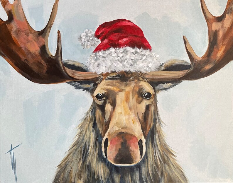 May include: A painting of a moose wearing a red and white Santa hat. The moose has brown antlers and a brown face with a pink nose. The background is a light blue.