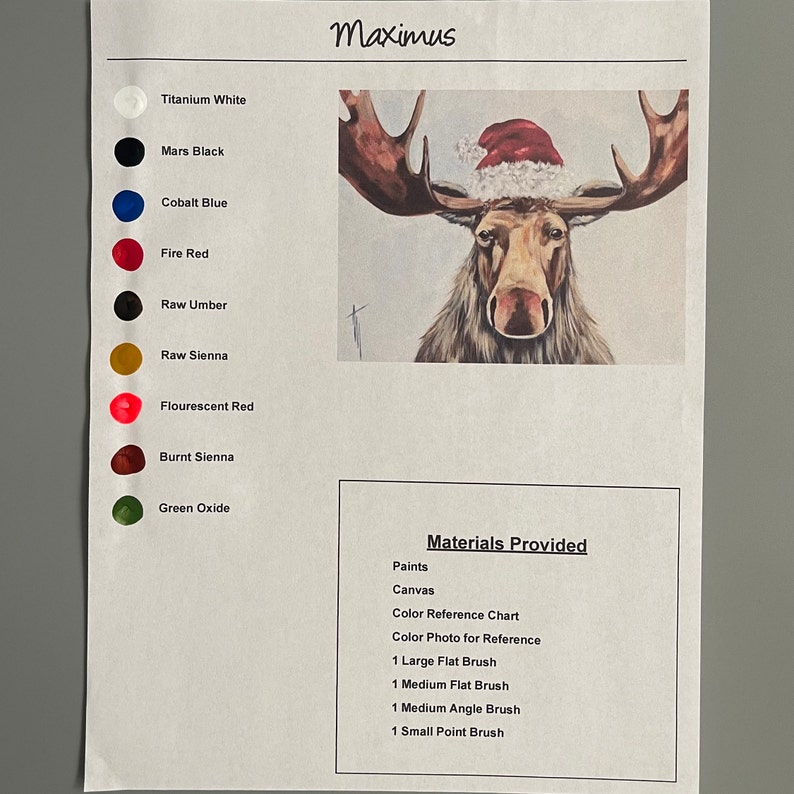 May include: A paint-by-numbers kit featuring a moose wearing a Santa hat. The kit includes paints, brushes, a canvas, a color reference chart, and a color photo for reference. The colors needed for the painting are listed on the left side of the page, with color swatches next to each color name.