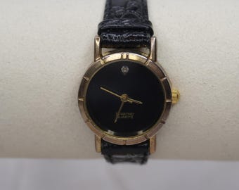 Pristine Gold and Black Snake Skin Leather Diamond Watch