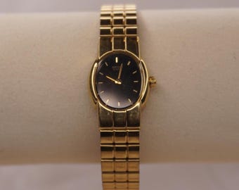 Luxury Seiko Black and Gold Watch