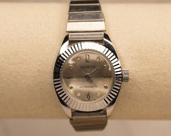 Rare Vintage Geneva Chinese Mother of Pearl White Stretch Watch Amazon.com: Geneva Super Large Stretch Watch Clear Number  main image 2