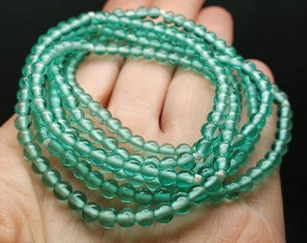 Teal - lichte oneindigheidsketting met Andara-kristallen