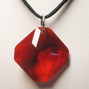 Andara Crystal Sacred Geometry Pendant Tetrahedron Deep Red / Lion&#39;s Heart