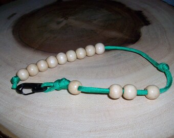 First paracord project! Ranger beads for pace counting using Celtic buttons  as beads : r/Survival