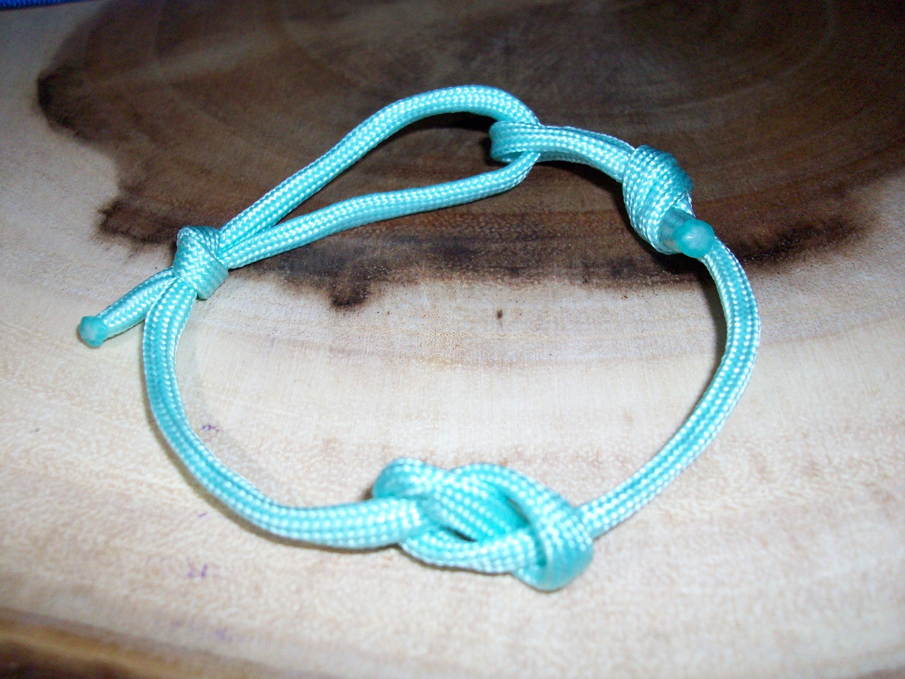 How to Embellish a Half Hitch Spiral Macrame Bracelet with Jump Rings / The  Beading Gem