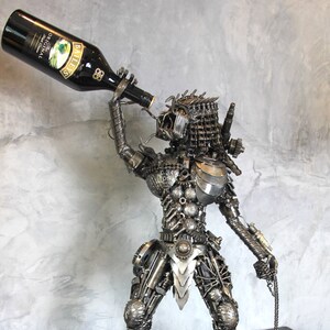 Predator Handle Bottle Inspired Recycled Scrap Metal Art