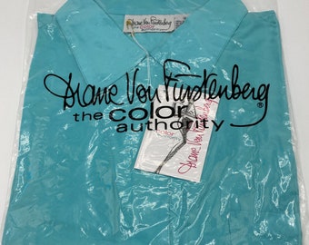 aqua silk blouse