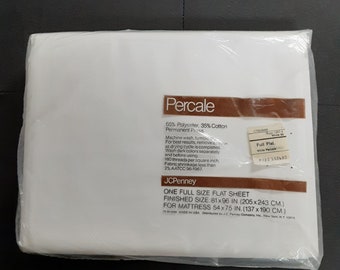 May include: A full-size flat sheet in a clear plastic package. The label reads "Percale" and "JCPenney." The sheet is white and made of 65% polyester and 35% cotton. Finished size is 81 x 96 inches (205 x 243 cm).