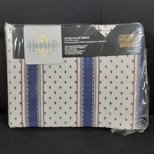 May include: A white queen-sized flat sheet with blue and red stripes and a green diamond pattern. The sheet is packaged and labeled "The Home Collection" and "Value Rite".