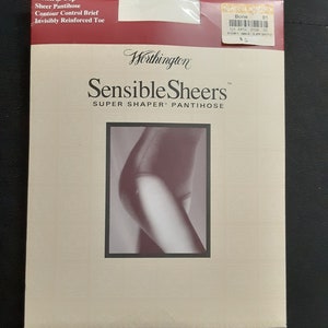 May include: Packaging for Worthington Sensible Sheers Super Shaper Pantihose. The packaging is white with a black border and features a photo of a woman wearing the pantihose. The text on the packaging reads "Worthington Sensible Sheers Super Shaper Pantihose".