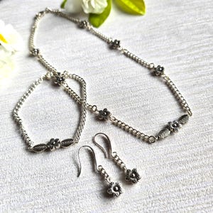 Silver Floral Jewelry Set: Stainless Steel Necklace, Bracelet & Earrings