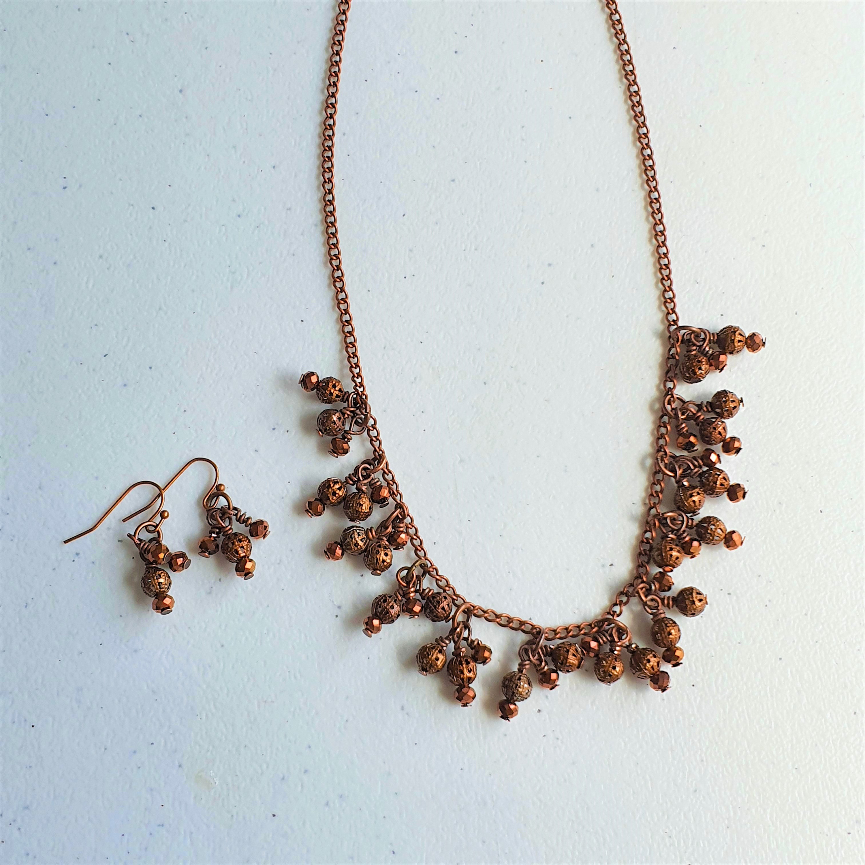 Distinctive Handmade Copper Jewelry Set with Deep Red Beads