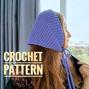 May include: A purple crochet bonnet with a long tie. The bonnet is made with a simple stitch pattern and has a pointed crown. CROCHET PATTERN is written in yellow letters on the image.